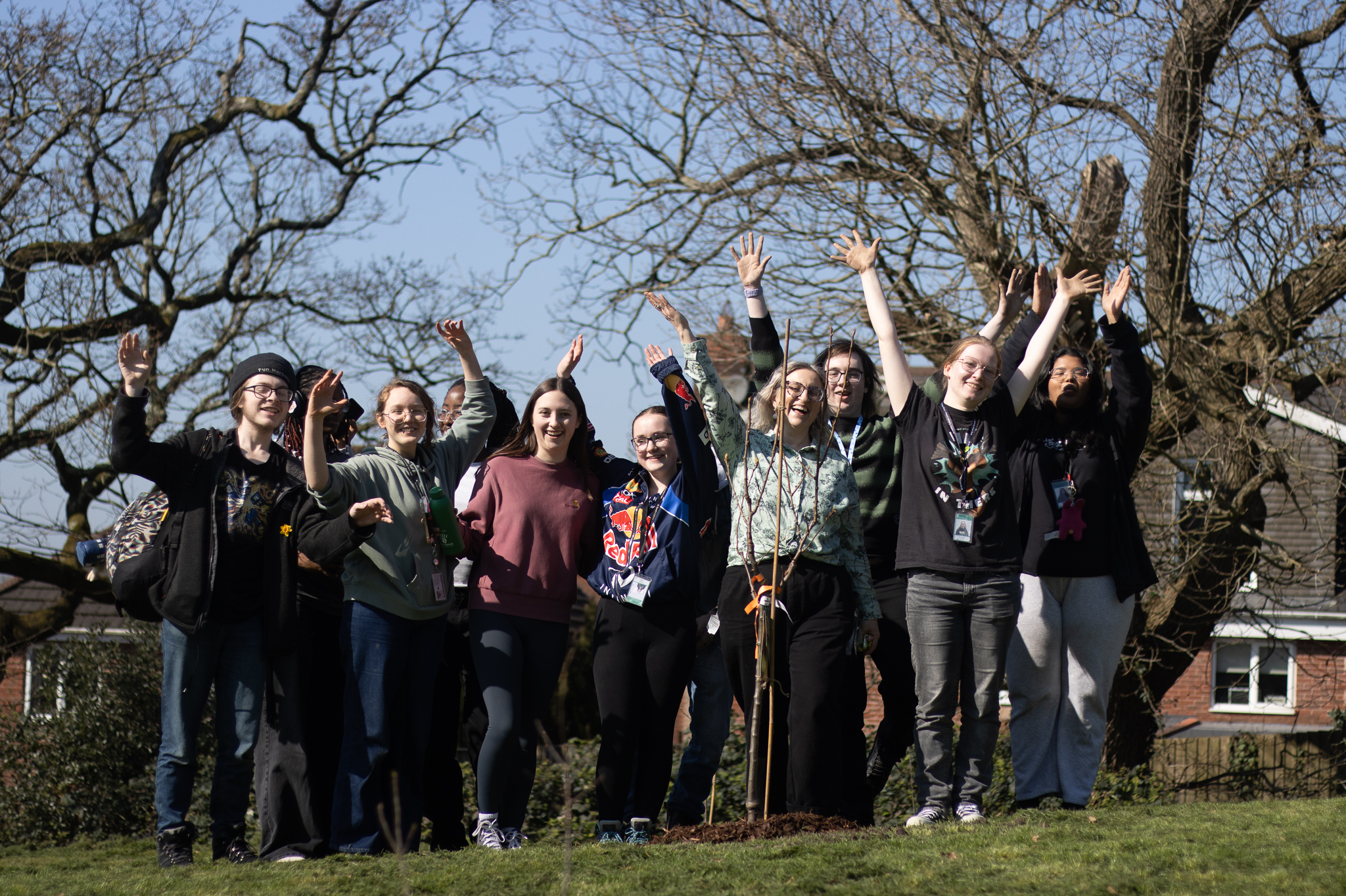 St David's Students waving on a hill