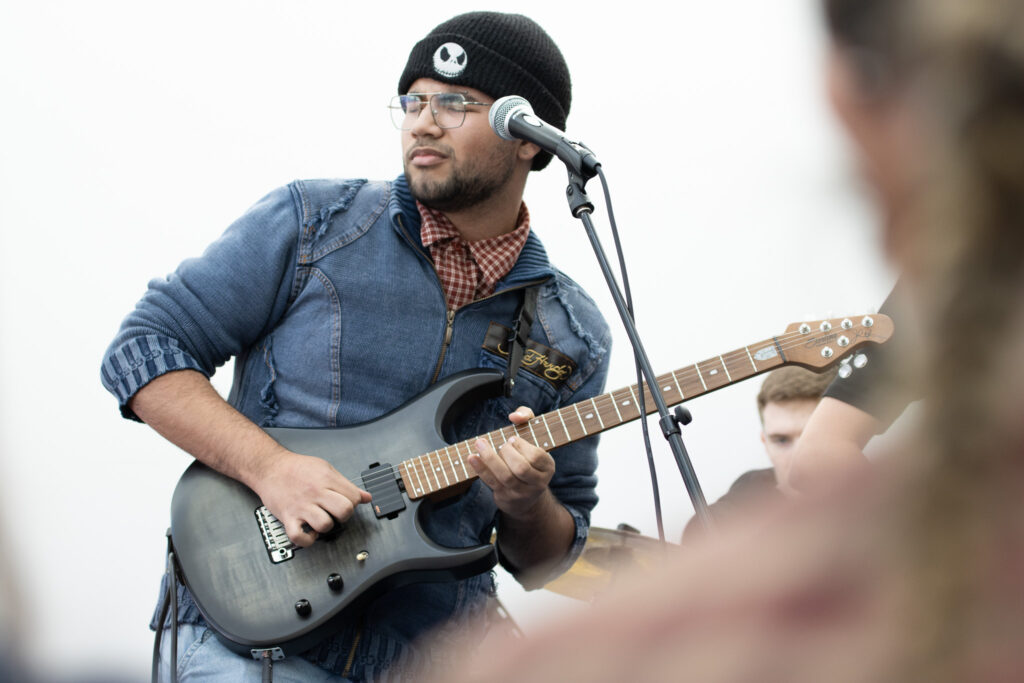 St Davids student playing guitar