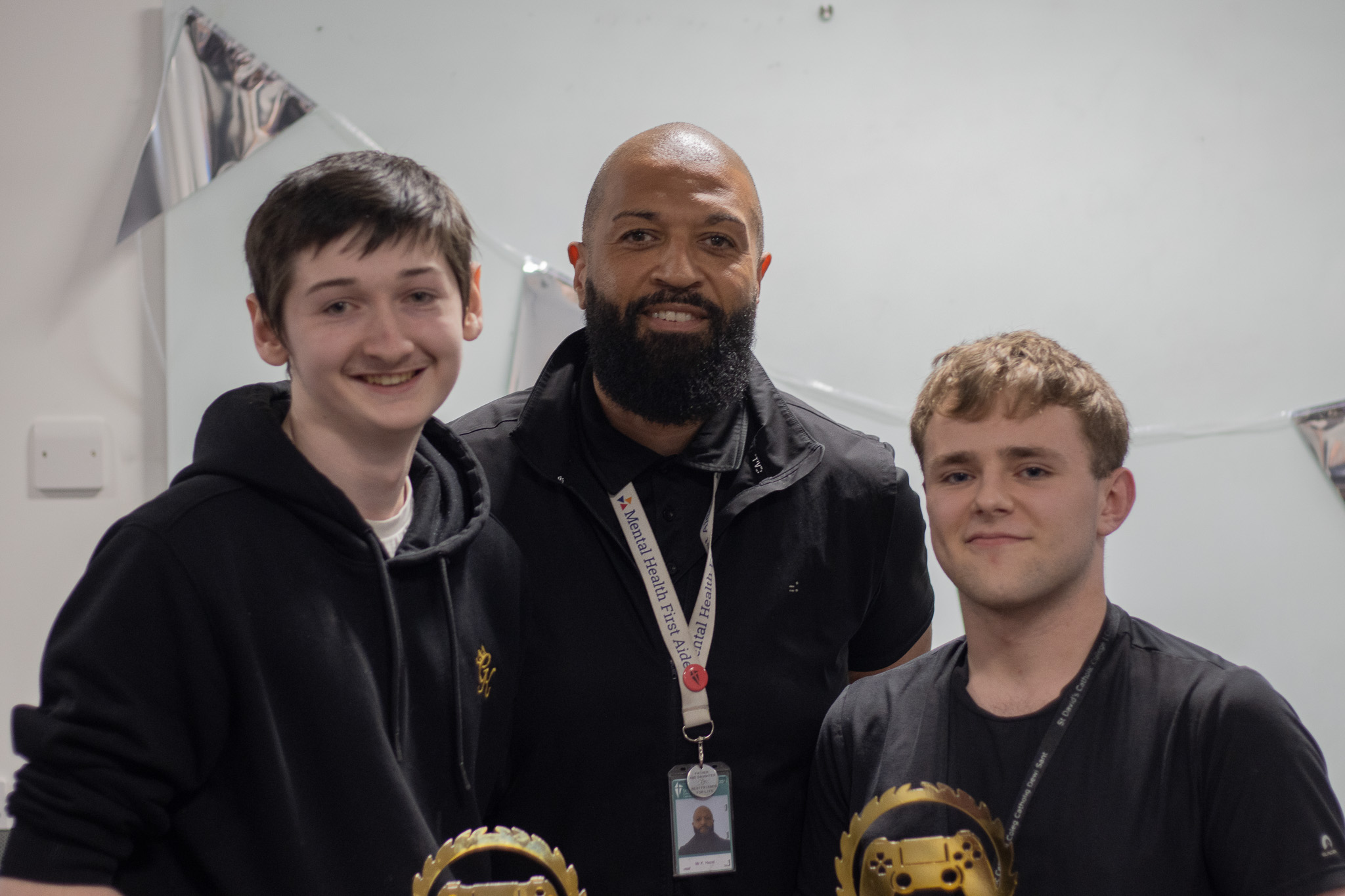 Overwatch players posing with awards