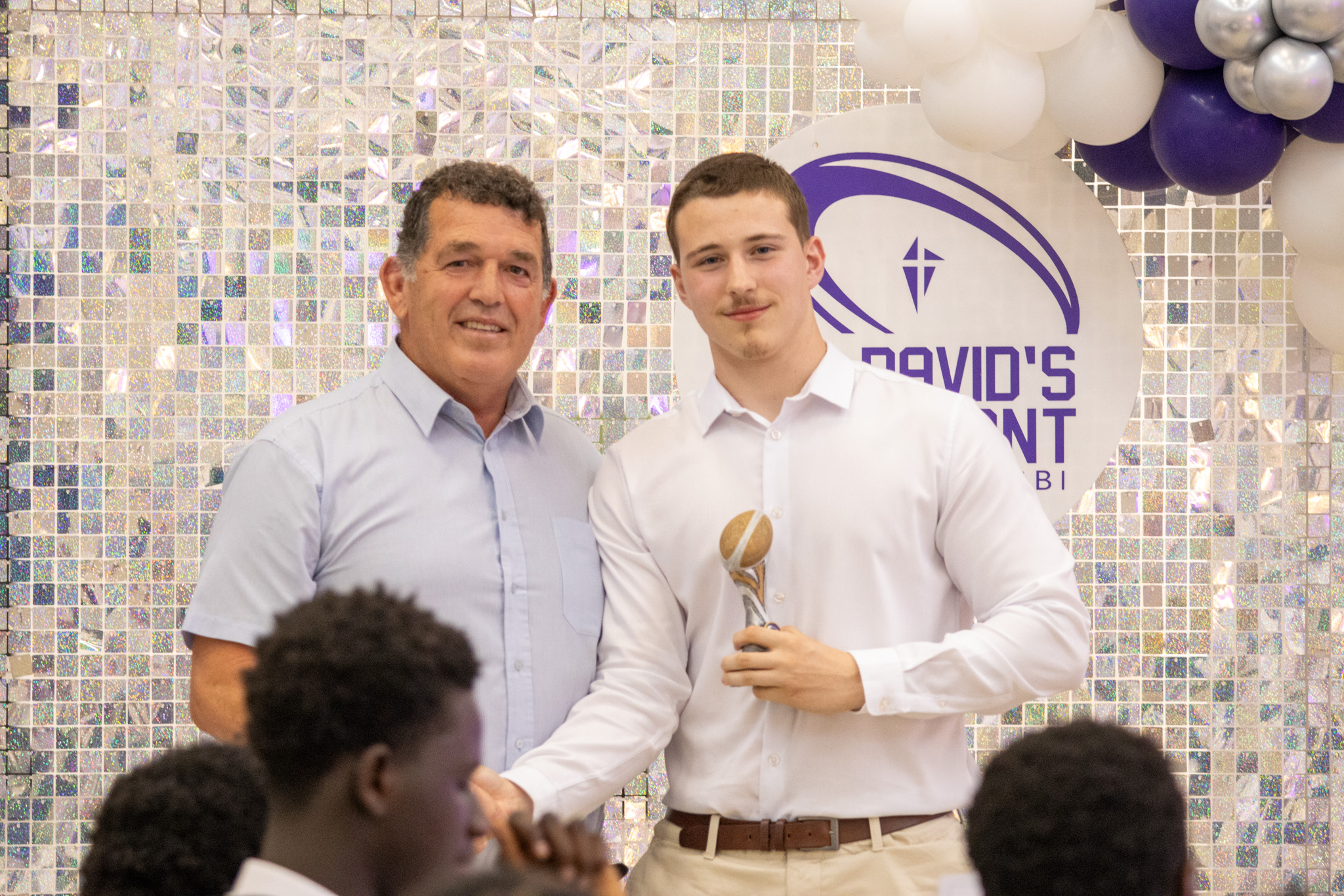 St David's College rugby player accepting award