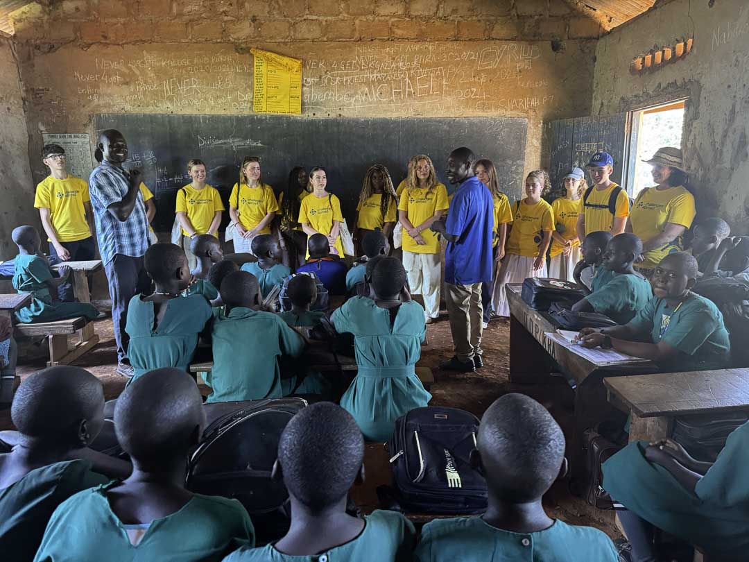 St David's students at the front of a classroom in Uganda